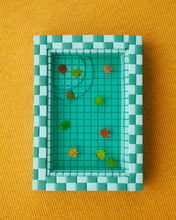 Load image into Gallery viewer, miniature pool with green tiles and fall leaves suspended in the resin water