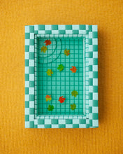 Load image into Gallery viewer, miniature pool with green tiles and fall leaves suspended in the resin water