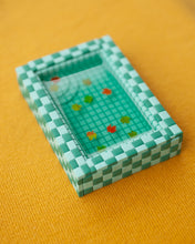 Load image into Gallery viewer, miniature pool with green tiles and fall leaves suspended in the resin water